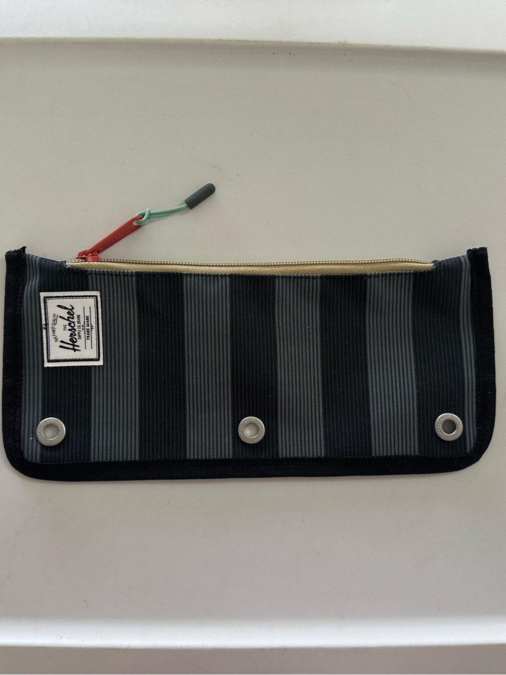 Herschel Supply Company Black and Gray Striped Toiletry Pouch with Colorful Pull